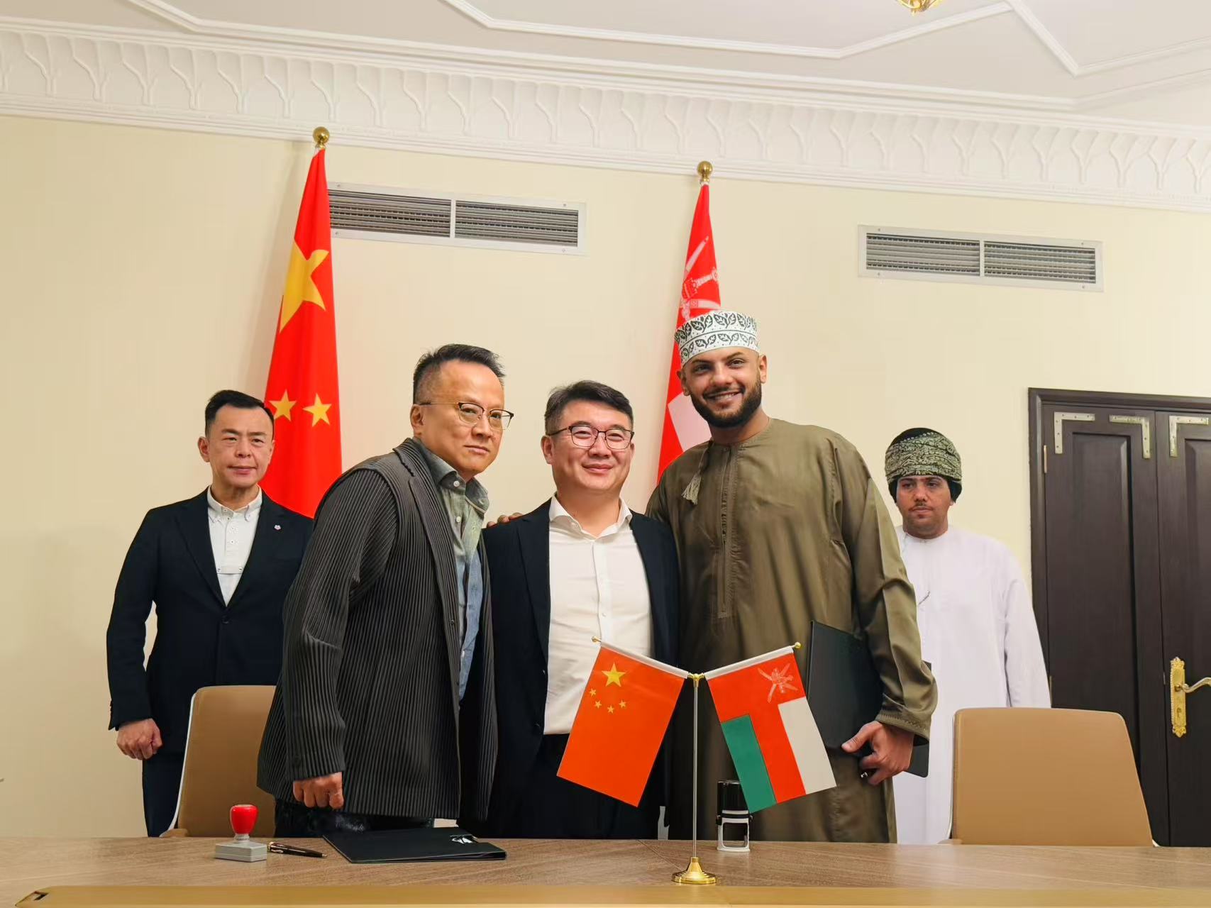 Business cooperation meeting with Omani and Chinese partners