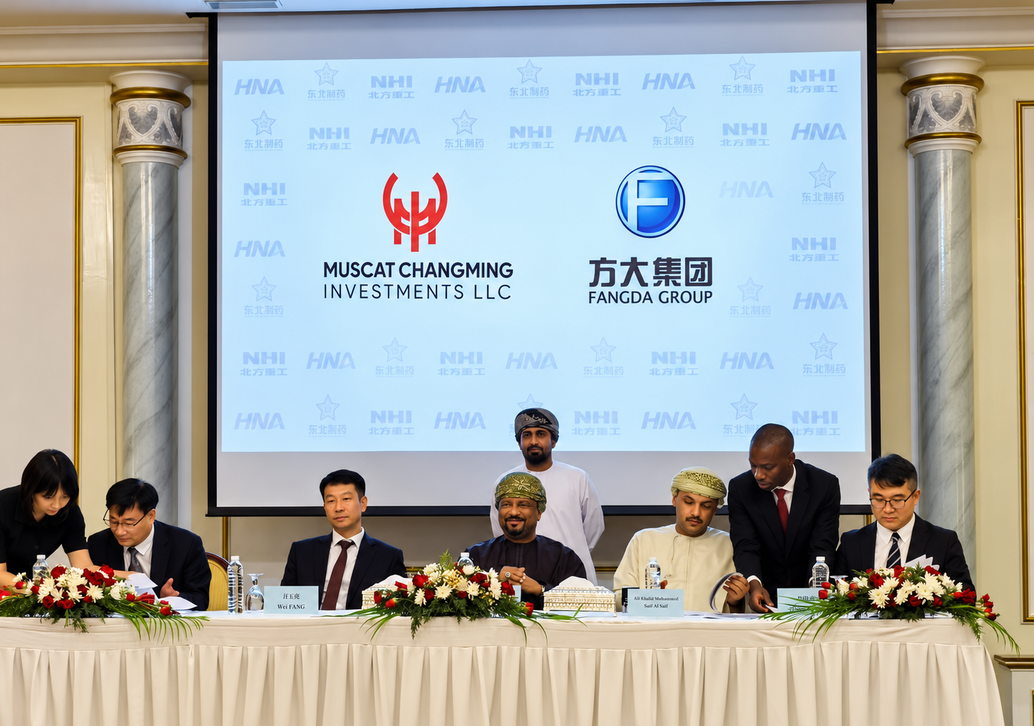 Chinese and Omani participants at the official agreement ceremony beneath the Muscat Changming Investments LLC and Fangda Group logos